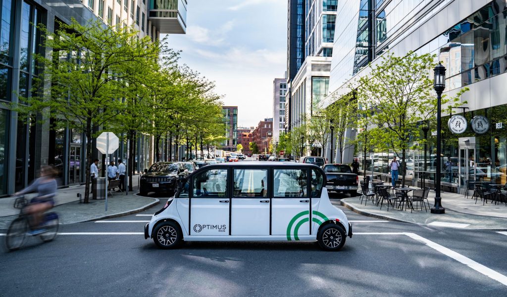 Compact autonomous shuttle operating in an urban area as an example of real-world AI mobility services